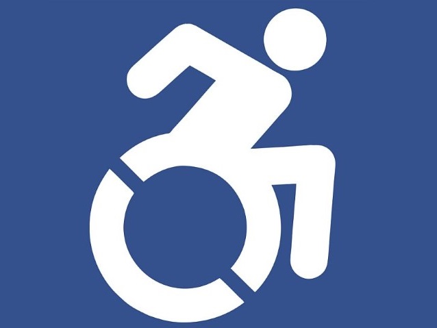 aktywny symbol osób z niepełnosprawnościami - przechylony do przodu człowiek na wózku