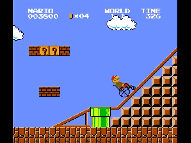 Mario na wózku wjeżdża po podjeździe na murek