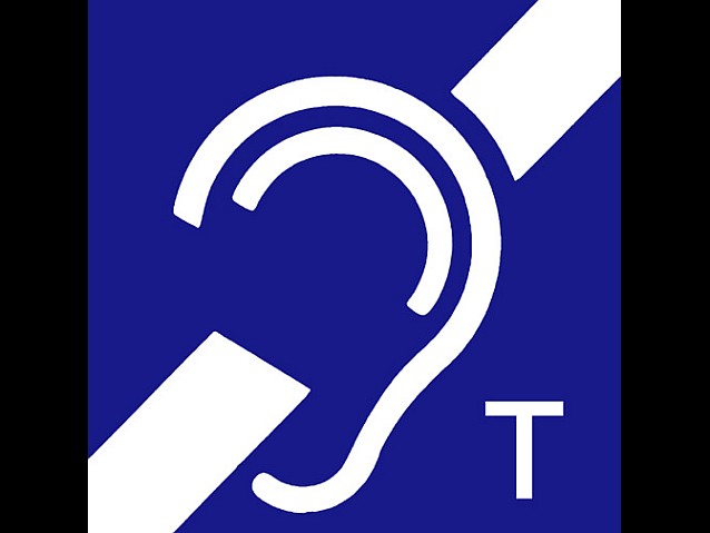 Oznakowanie pętli indukcyjnej, czyli przekreślone ucho z literką T obok